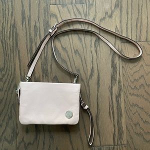 Vince Camuto light pink pebble leather cross body bag.